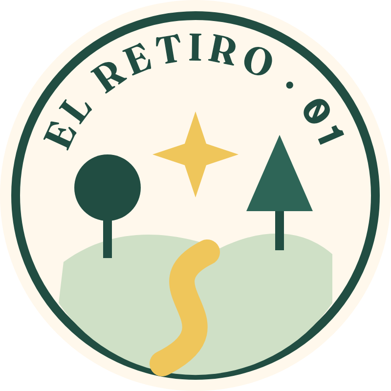 Pegatina de la edición 01, El Retiro: un camino entre árboles y una estrella.